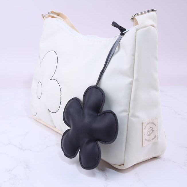 Fluffy quilted shoulder bag & bag charm